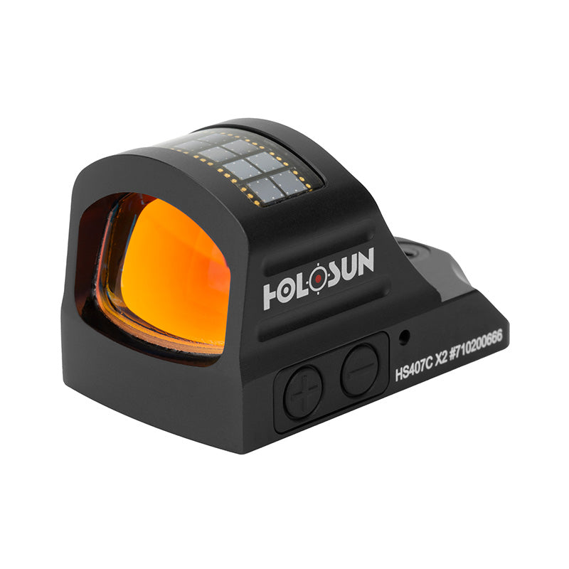 Front left view of Holosun HS407C X2 red dot sight showing the lens, solar panel, and adjustment controls